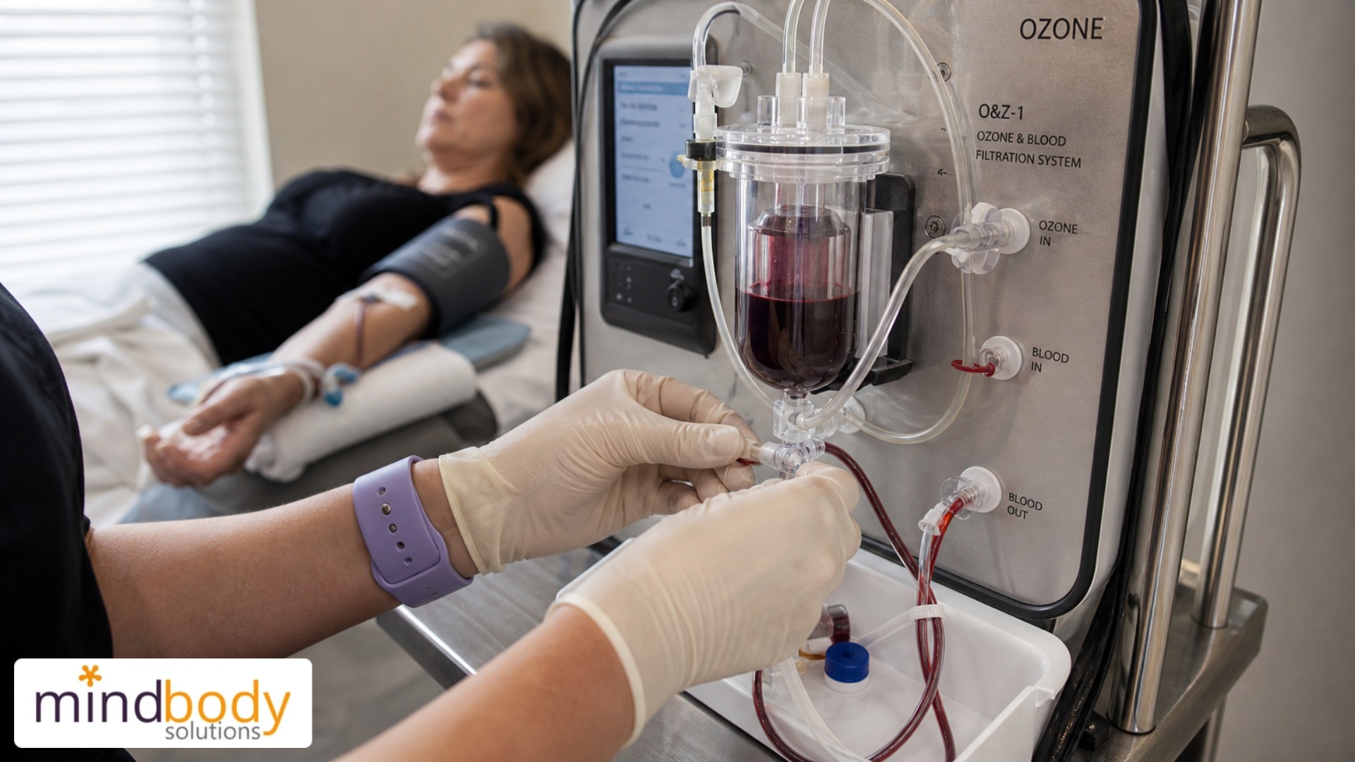 Patient receiving EBOO ozone IV therapy blood treatment in clinical setting